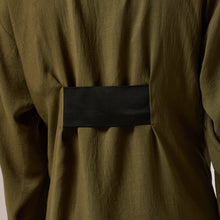 Load image into Gallery viewer,   ZERØ London - Close up view, olive green long sleeve mens zero waste shirt designed &amp; made in London
