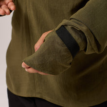 Load image into Gallery viewer,   ZERØ London - Close up view, olive green long sleeve mens zero waste shirt designed &amp; made in London
