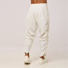 Load image into Gallery viewer, ZERØ London - Back mid-length view. Mens zero waste tapered trouser with gathers in white. Designed &amp; made in London
