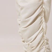 Load image into Gallery viewer, ZERØ London - Close up view. Mens zero waste tapered trouser with gathers in white. Designed &amp; made in London
