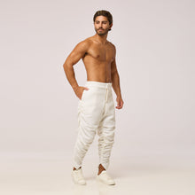Load image into Gallery viewer, ZERØ London - Front Full-length view. Mens zero waste tapered trouser with gathers in white. Designed &amp; made in London
