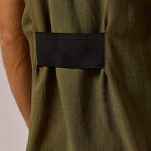 Load image into Gallery viewer,   ZERØ London - Close up view, olive green mens zero waste vest designed &amp; made in London
