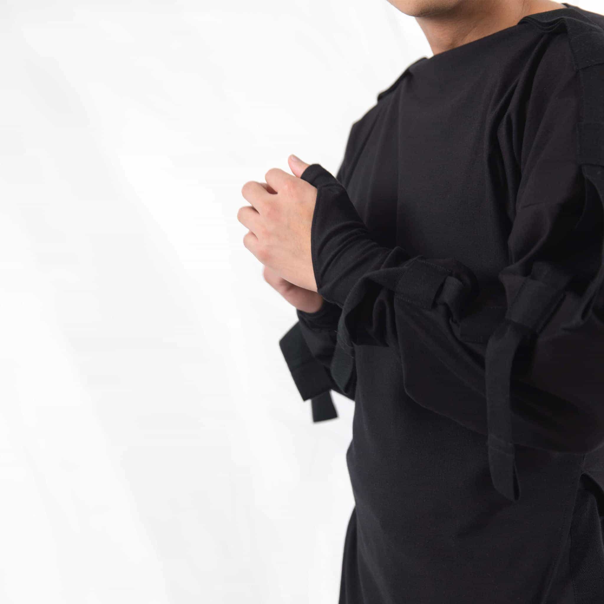 ZERØ London - Alt. close up, mens zero waste long sleeve jersey jumper in black with contrast black straps designed & made in London