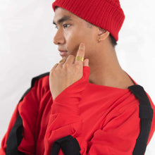 Load image into Gallery viewer, ZERØ London - Close up, mens zero waste long sleeve jersey jumper in red with contrast black straps designed &amp; made in London
