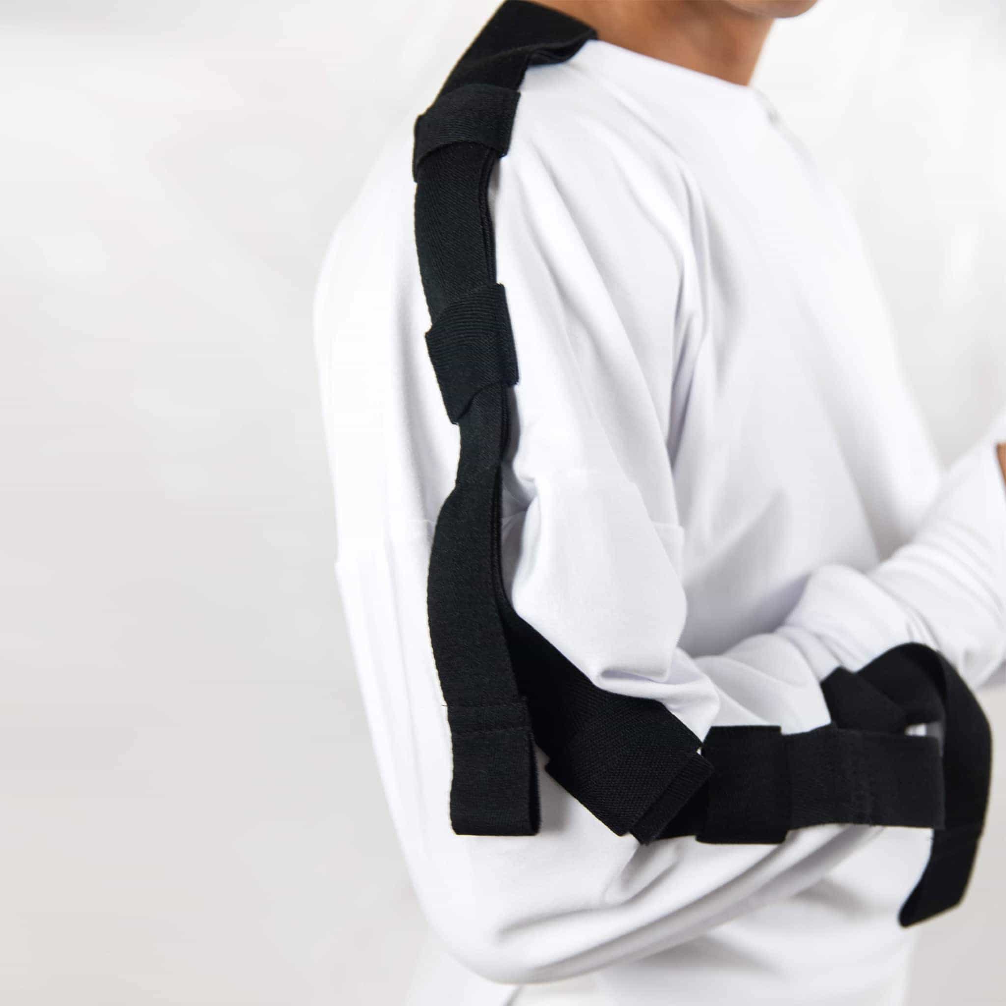 ZERØ London - Close up, mens zero waste long sleeve jersey jumper in white with contrast black straps designed & made in London