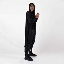 Load image into Gallery viewer,   ZERØ London - Side view, black long sleeved zero waste cardigan robe with harness and black trousers designed &amp; made in London
