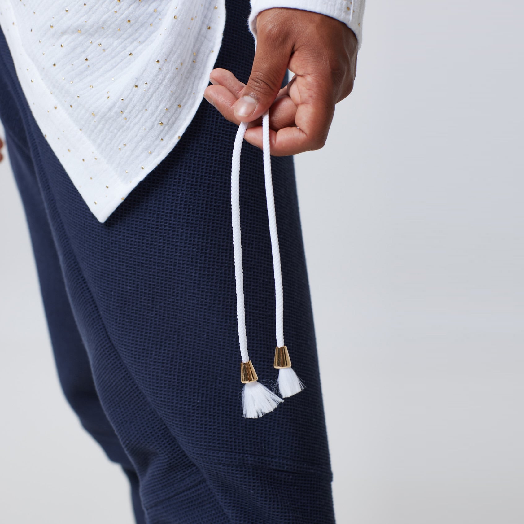 ZERØ London - Close up view, mens luxury cotton drawstring navy shirt, zero waste fashion, designed & made in London