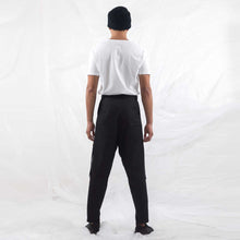 Load image into Gallery viewer,   ZERØ London - Close up,  mens black zero waste trousers with gold d rings and contrast stripe designed &amp; made in London
